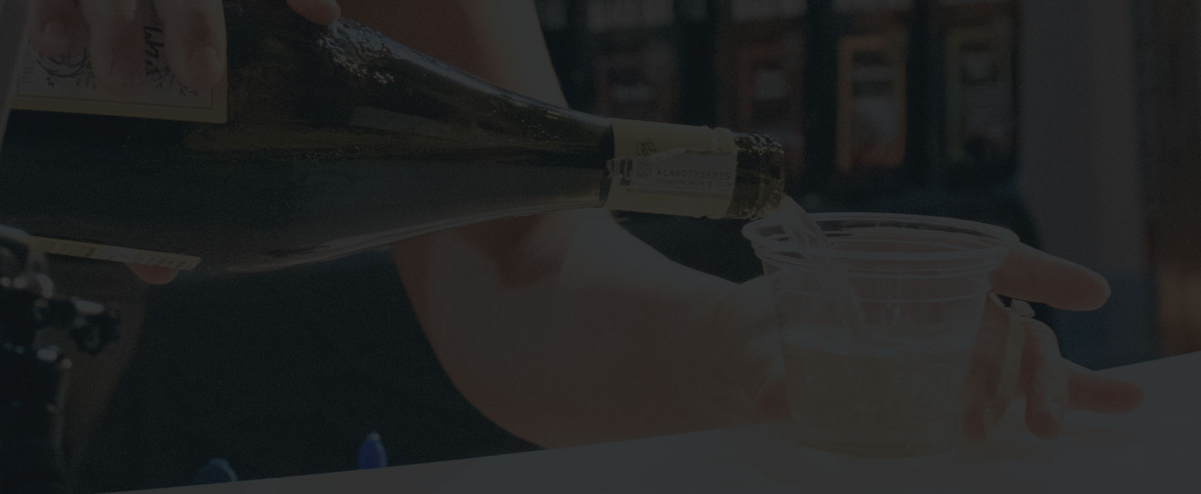 Hero image of wine being poured into a cup